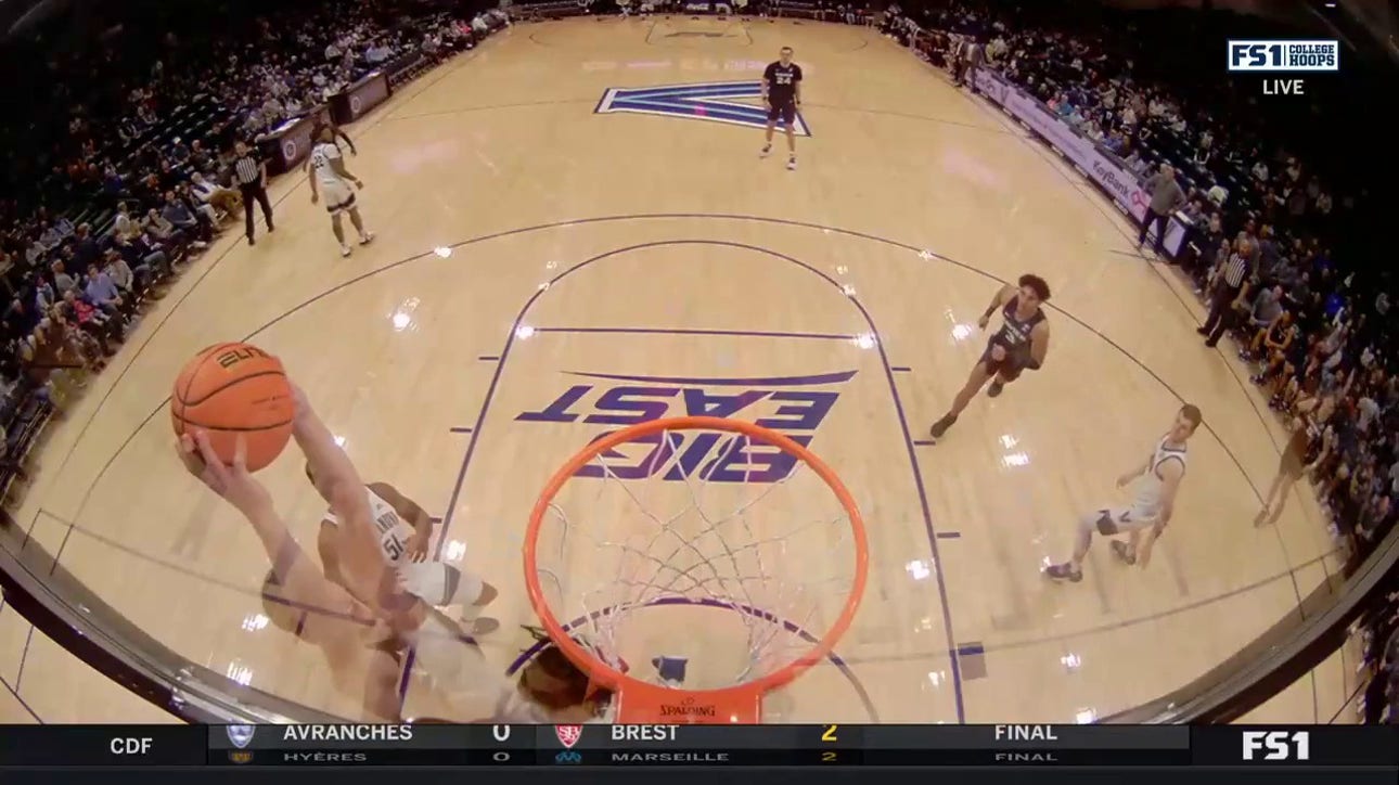 Zach Freemantle throws down the two handed dunk to increase Xavier's second half lead