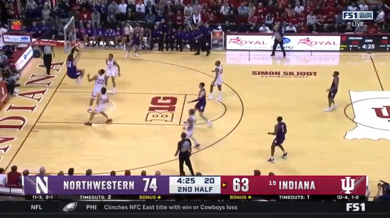 Northwestern's Matthew Nicholson throws down an exclamation mark dunk against No. 15 Indiana