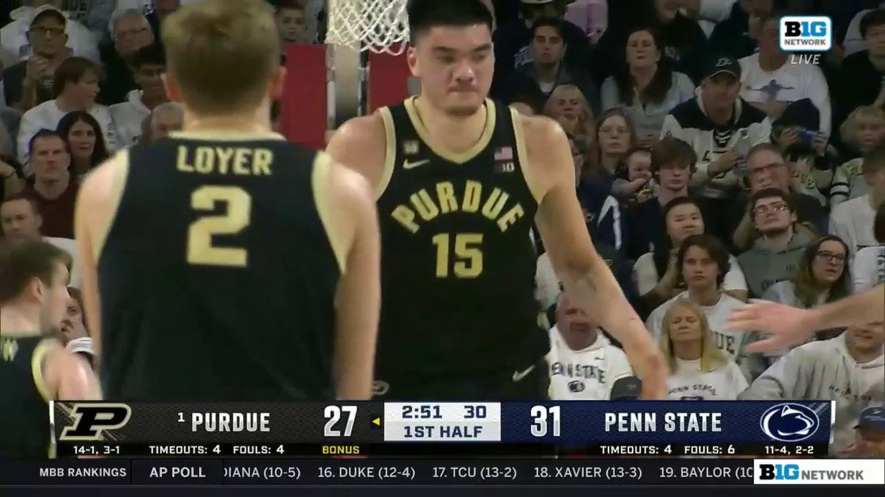 Purdue's Zach Edey throws down an alley-oop jam to trim into Penn State's lead
