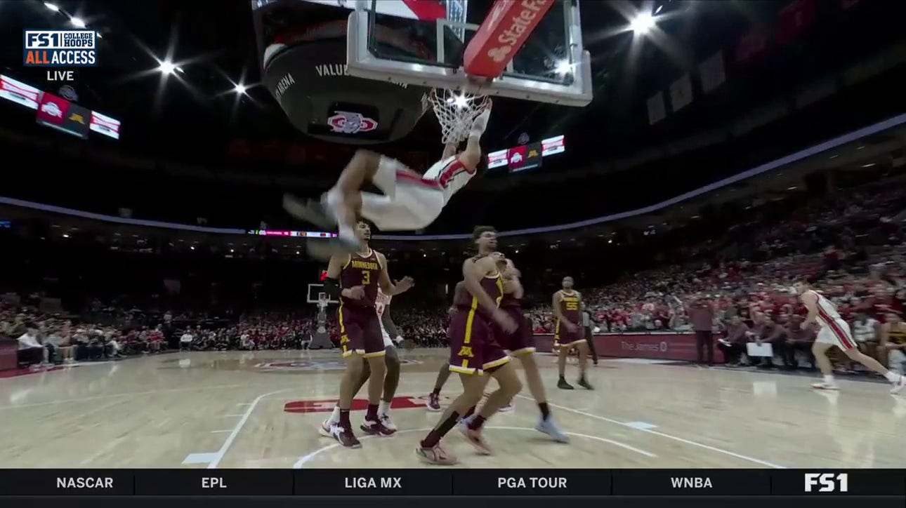 Tanner Holden hammers home a two-handed dunk for Ohio St. against Minnesota