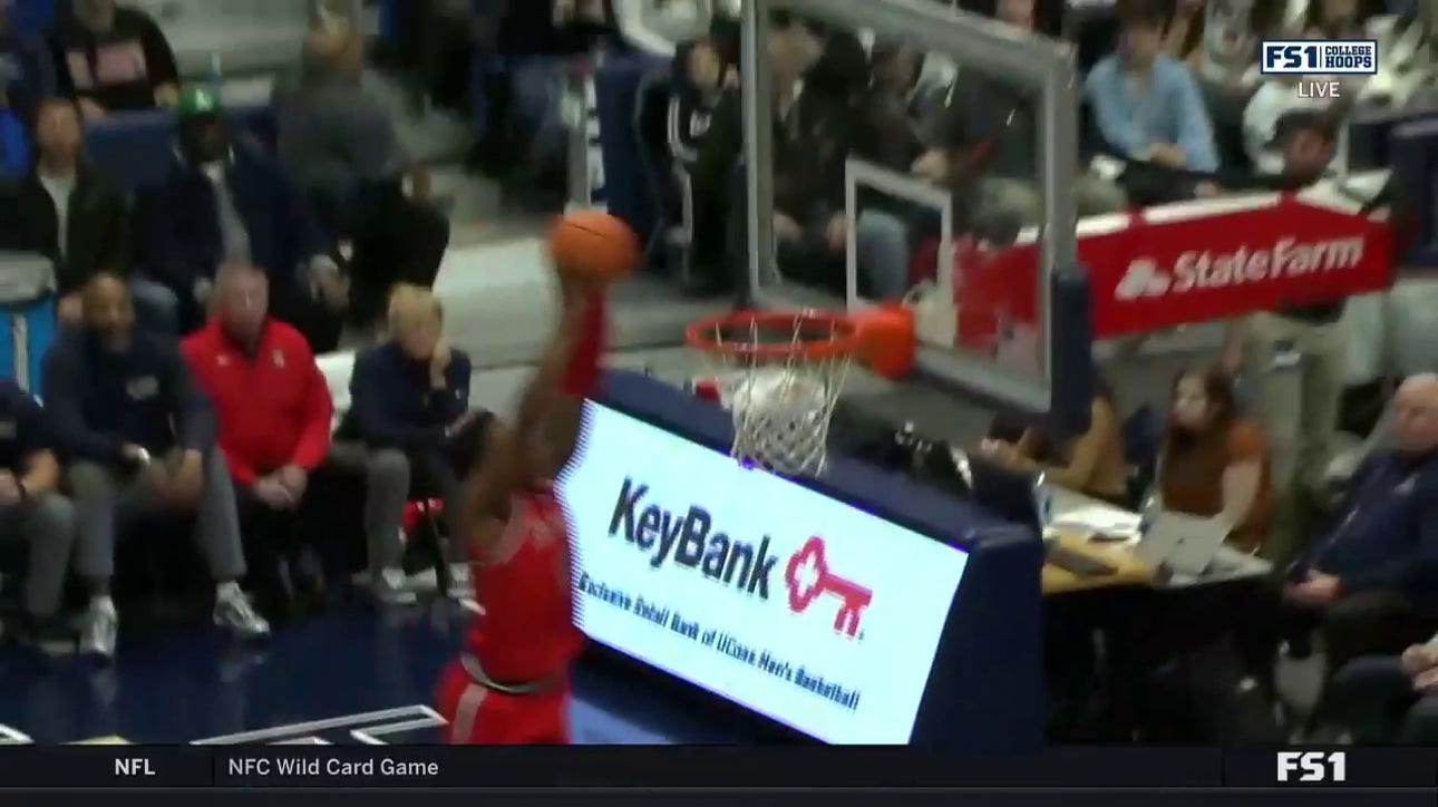 AJ Storr throws down a break-away dunk to increase St. John's second half lead over UConn