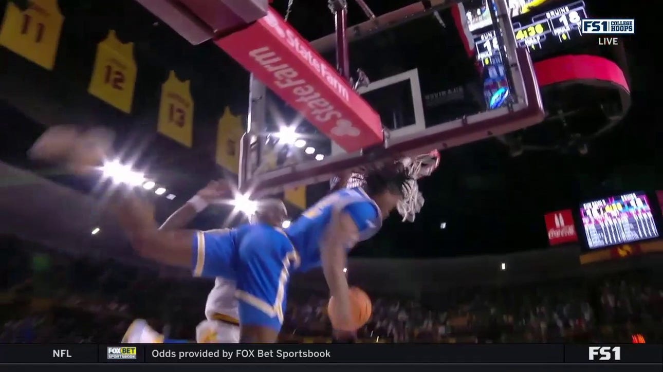 UCLA's Dylan Andrews comes away with the steal and throws down a monster two-handed jam against Arizona State
