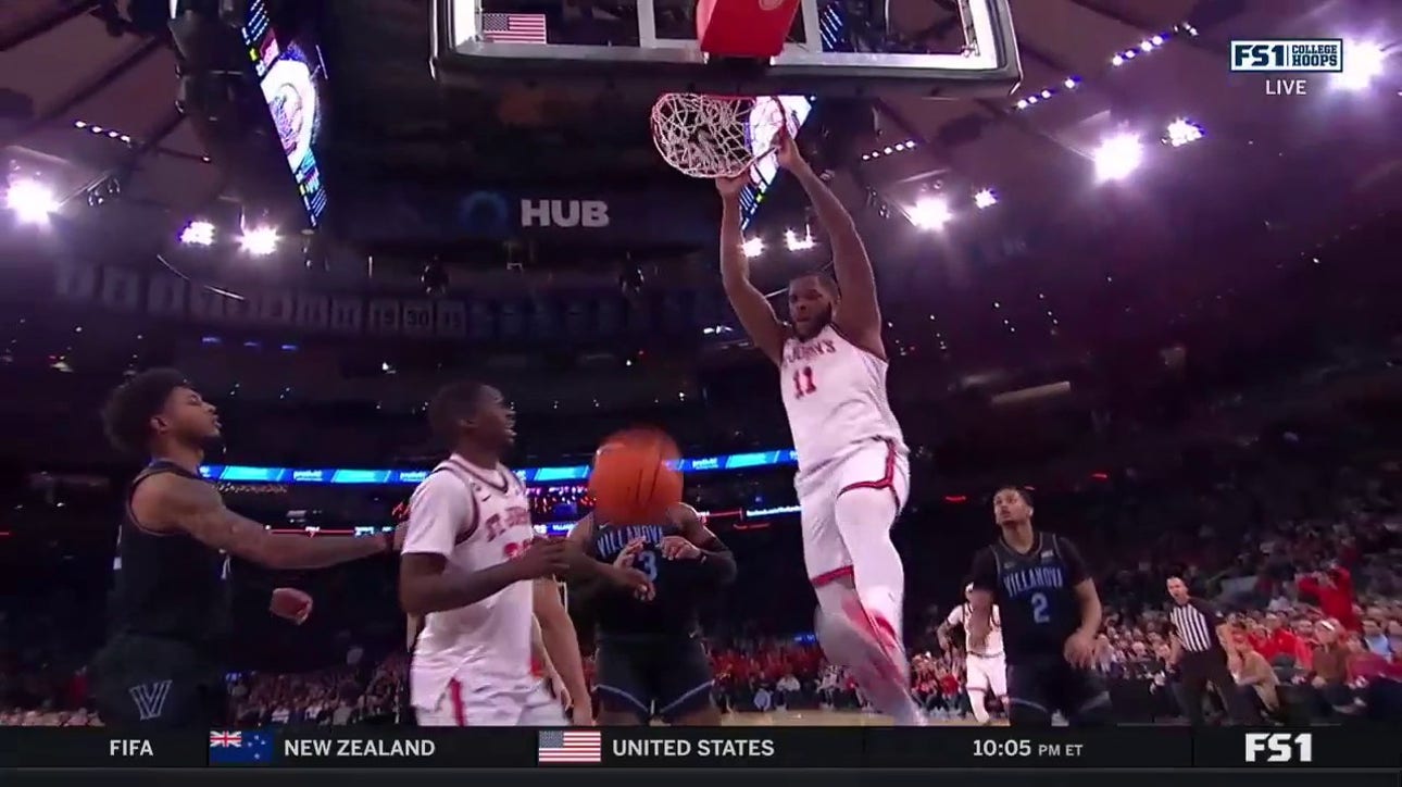 Joel Soriano hammers in a two-hand slam for St. John's, extending their lead against Villanova