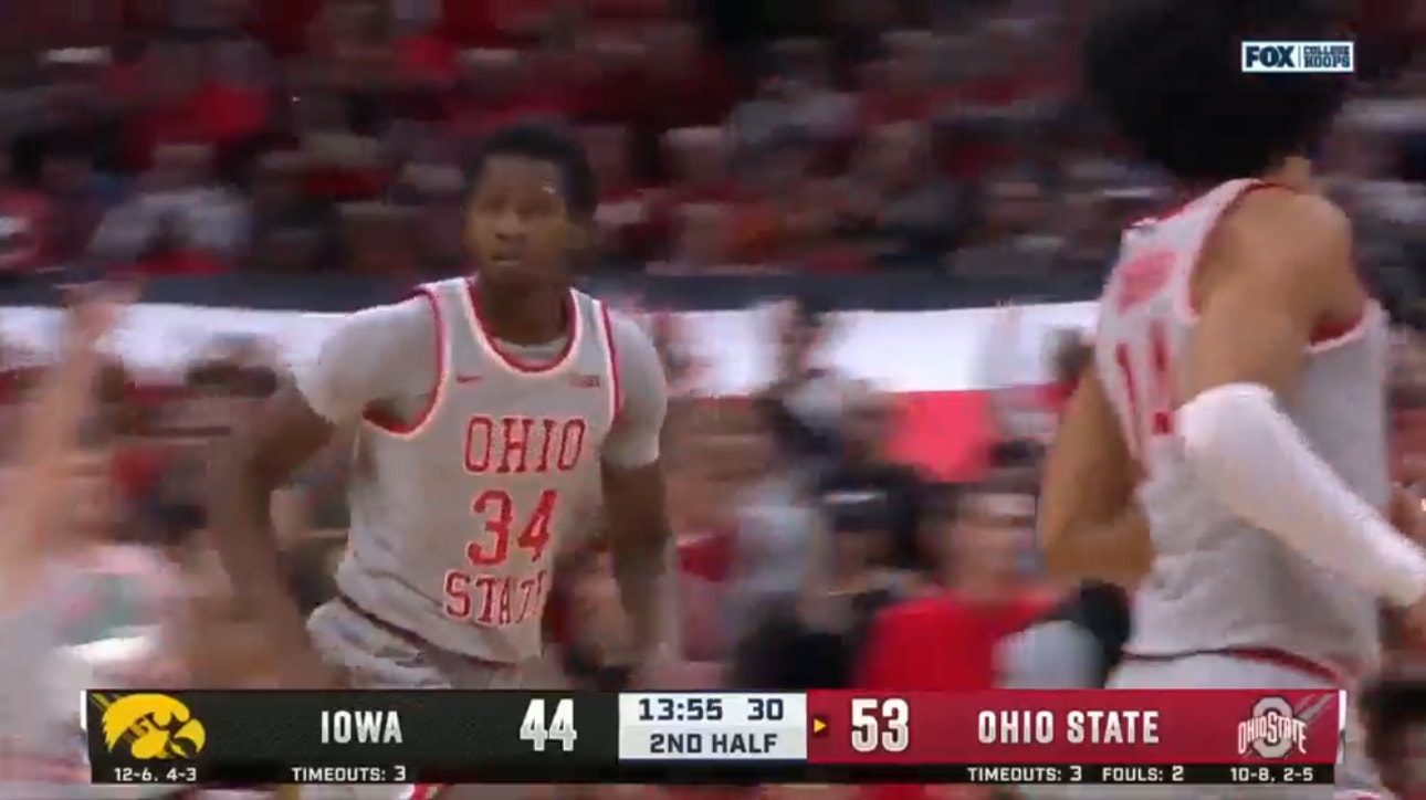 Ohio State's Felix Okpara comes through with a smooth dunk for the Buckeyes, extending the lead over Iowa