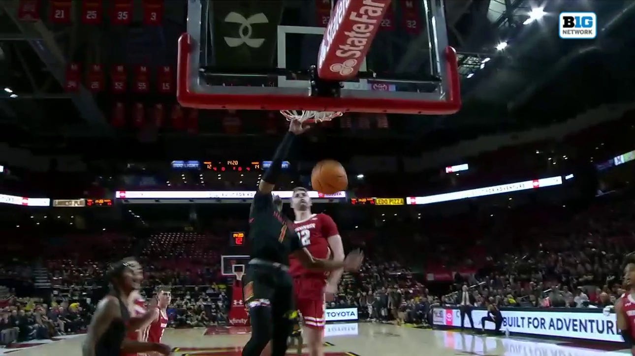 Maryland's Jahmir Young SLAMS in a hammer dunk against Wisconsin