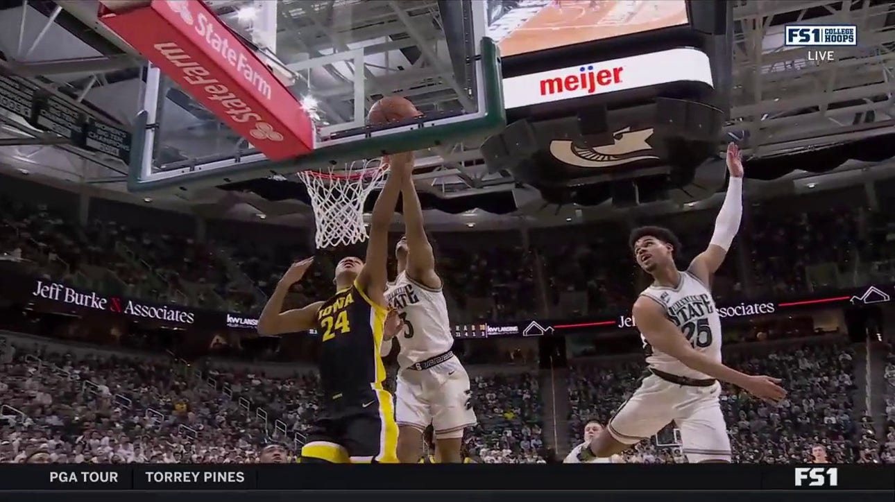 Michigan State's Jaden Akins makes the huge block to stop the break away layup