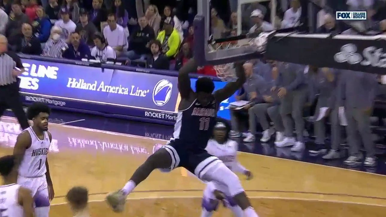 Arizona's Oumar Ballo finishes a HUGE two-handed dunk to increase the Wildcat's second half lead