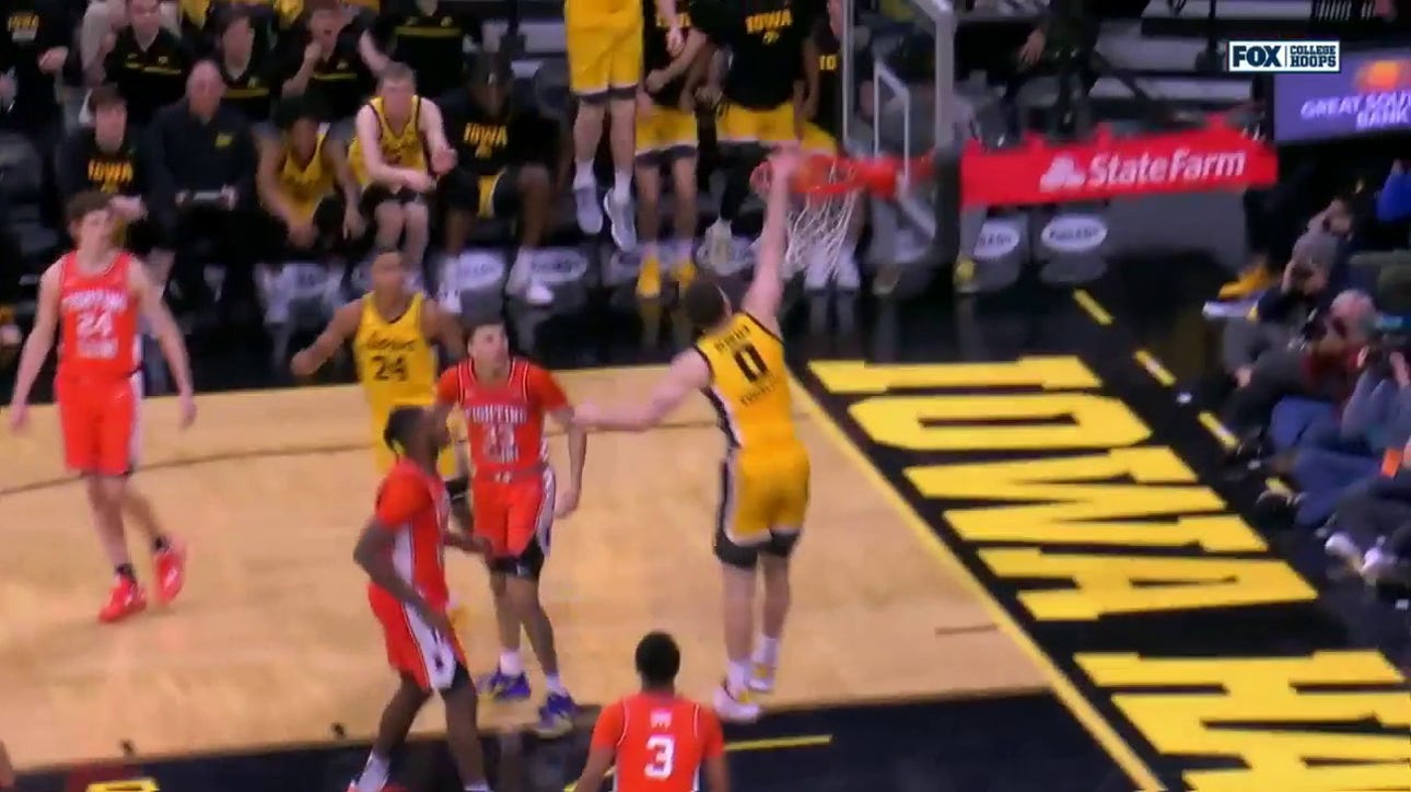 Filip Rebraca takes it home with this one-handed jam for Iowa against Illinois