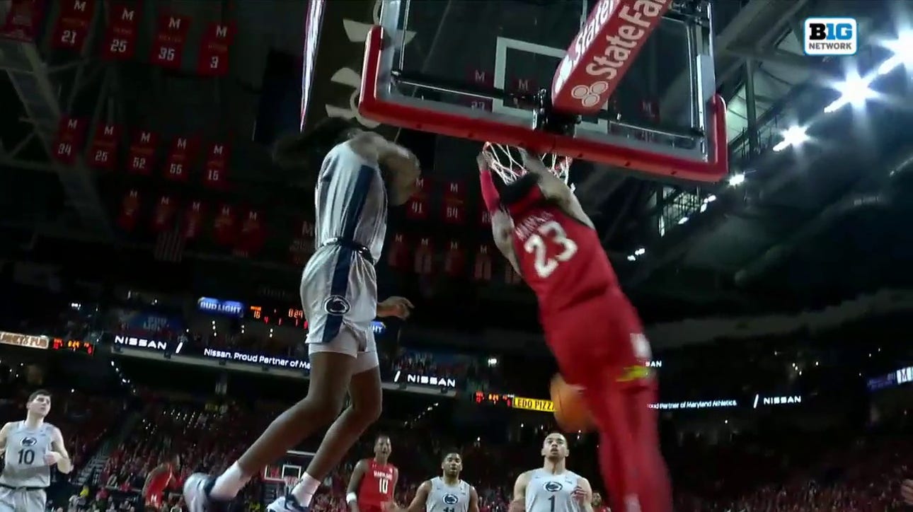 Ian Martinez throws down an alley-oop dunk from Jahmir Young to extend Maryland's lead