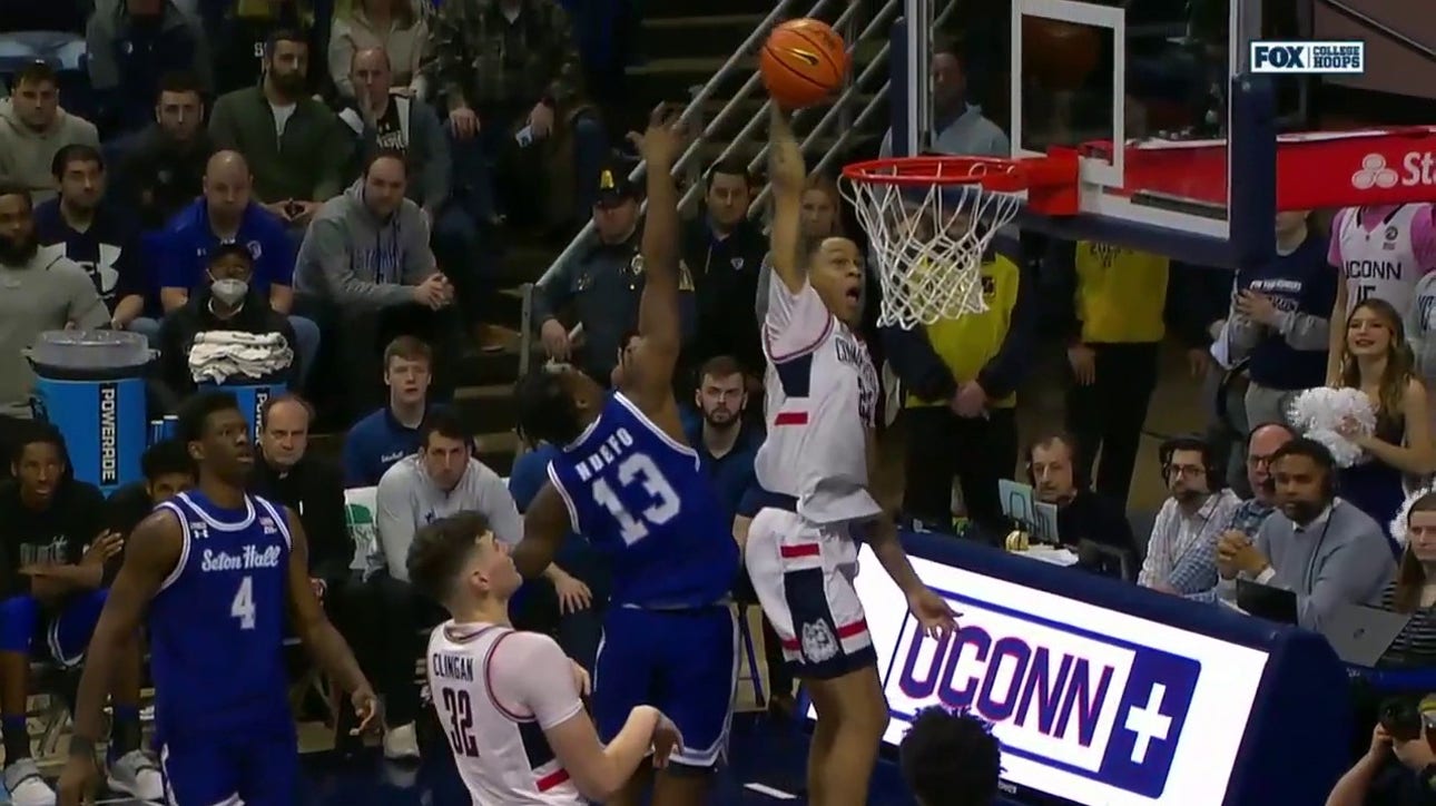 UConn's Jordan Hawkins sneaks up the baseline and delivers a NASTY one-handed jam against Seton Hall