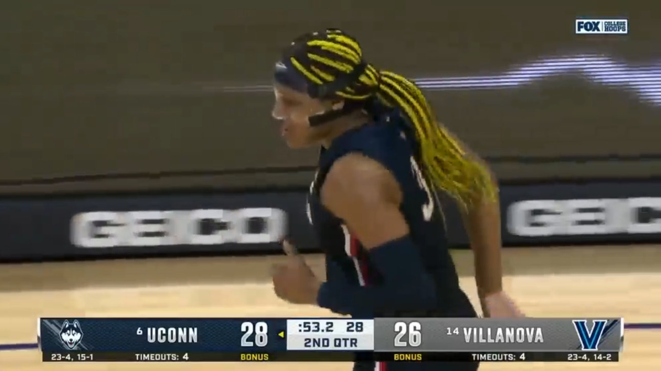UConn's Aaliyah Edwards' layup gives the Huskies a slight lead at the half