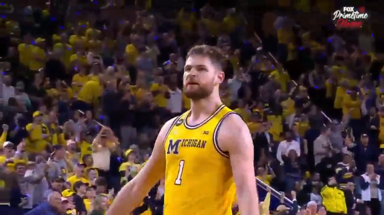 Michigan's Hunter Dickinson drains a CLUTCH 3-pointer to seal victory against Michigan State