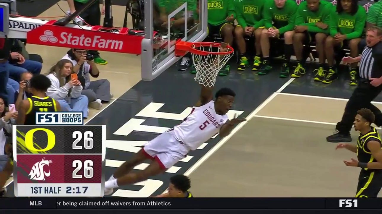 TJ Bamba comes up with a steal and throws down a fastbreak dunk to bring Washington St. to a tie with Oregon