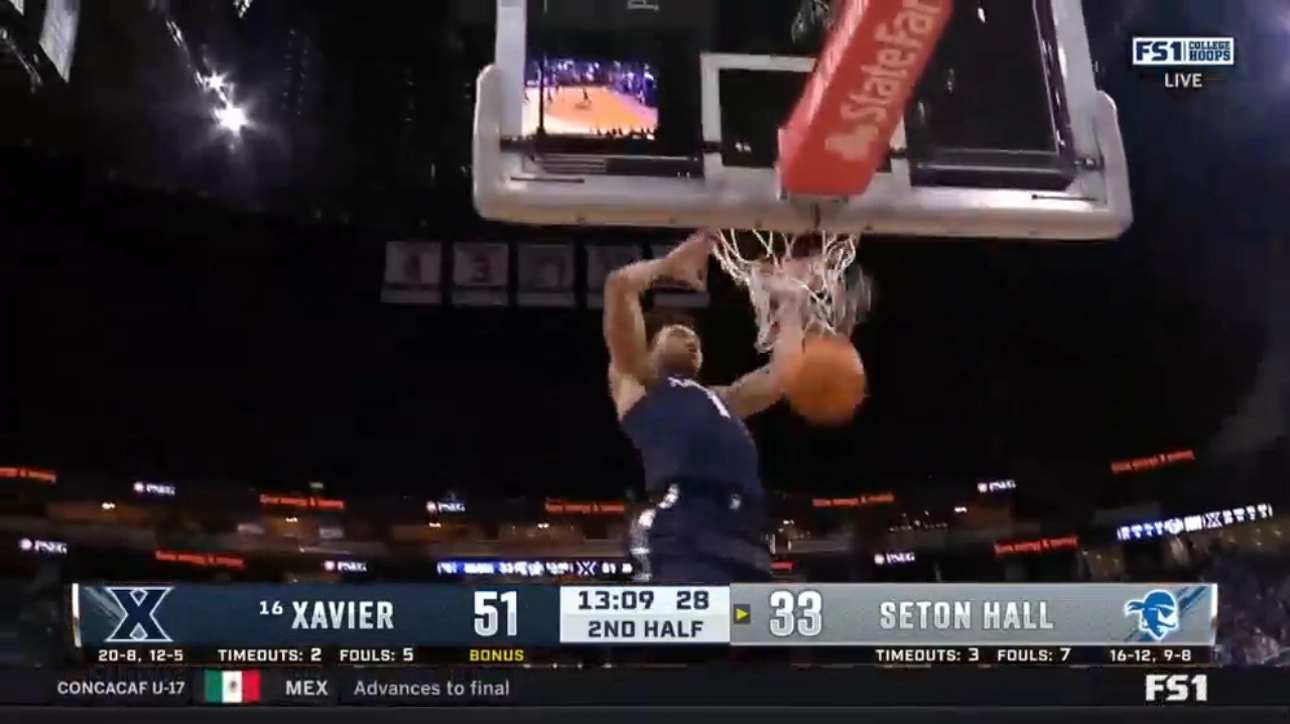Desmond Claude pick-pockets Seton Hall and finishes with a two-handed flush extending Xavier's lead