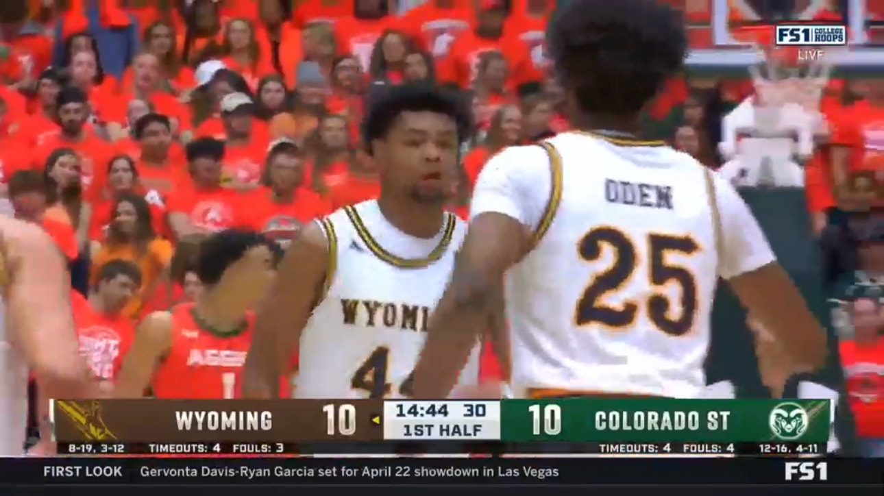 Wyoming's Caden Powell powers down the two-hand jam to tie the game against Colorado State