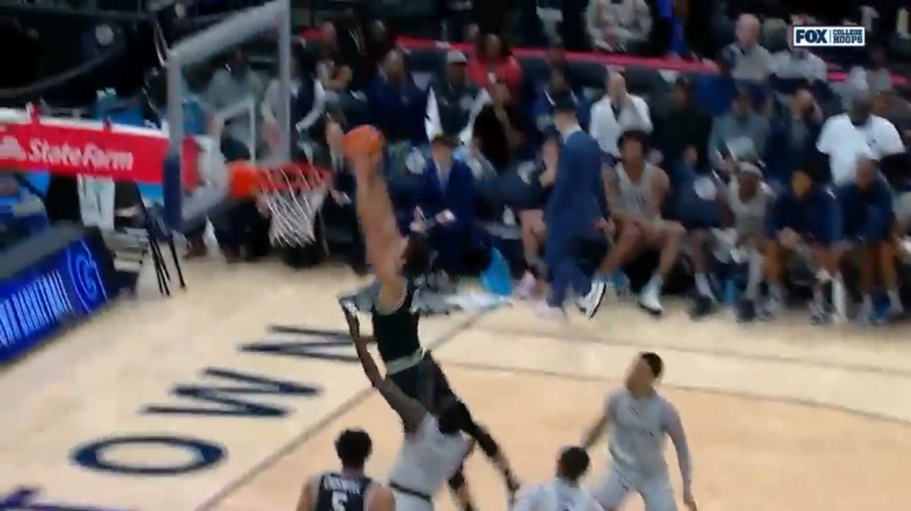 Clifton Moore throws the big fast break dunk to extend Providence's lead over Georgetown