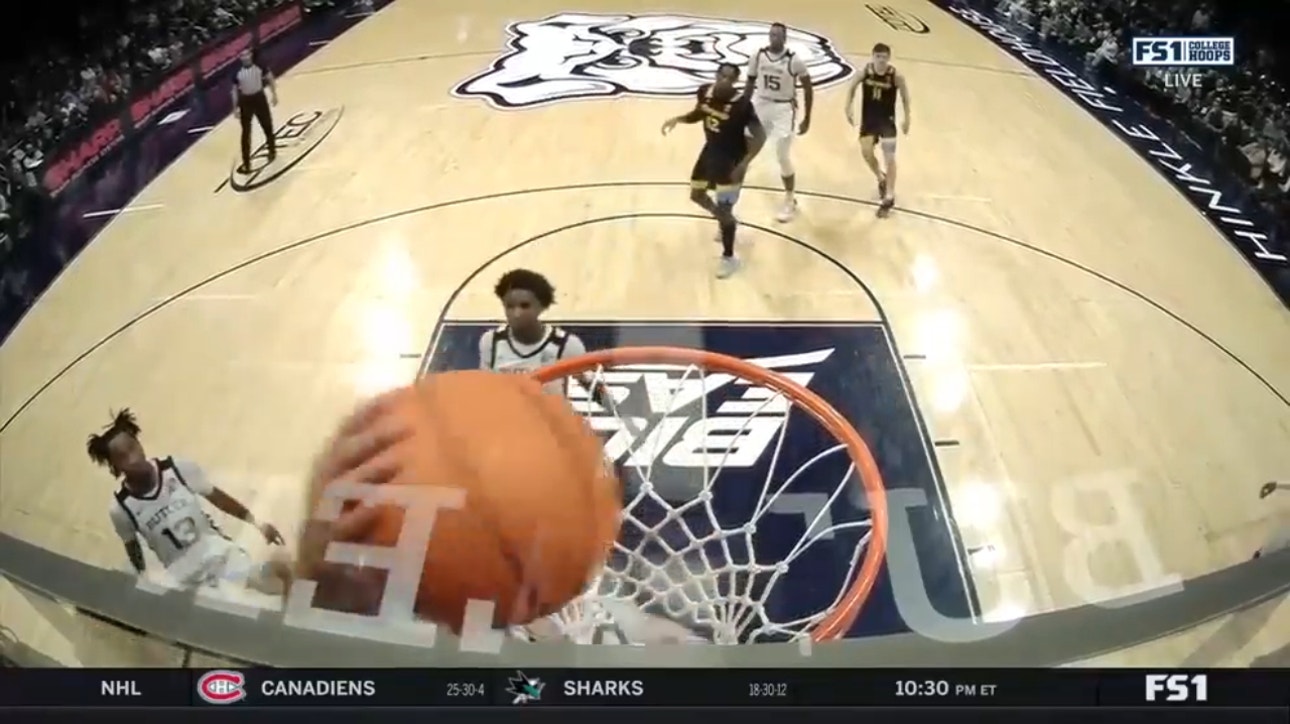 Marquette's Oso Ighodaro spins out, throws it down over the Bulldogs