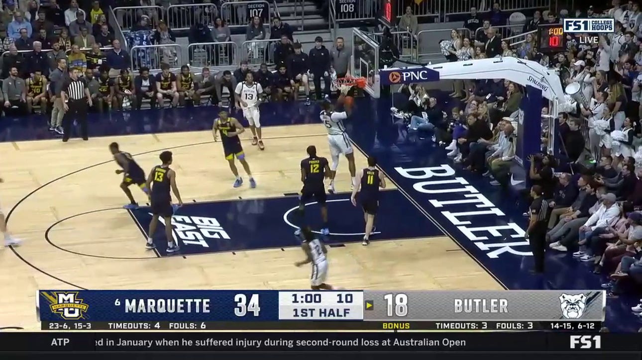 Butler's Manny Bates delivers a two-handed jam against Marquette