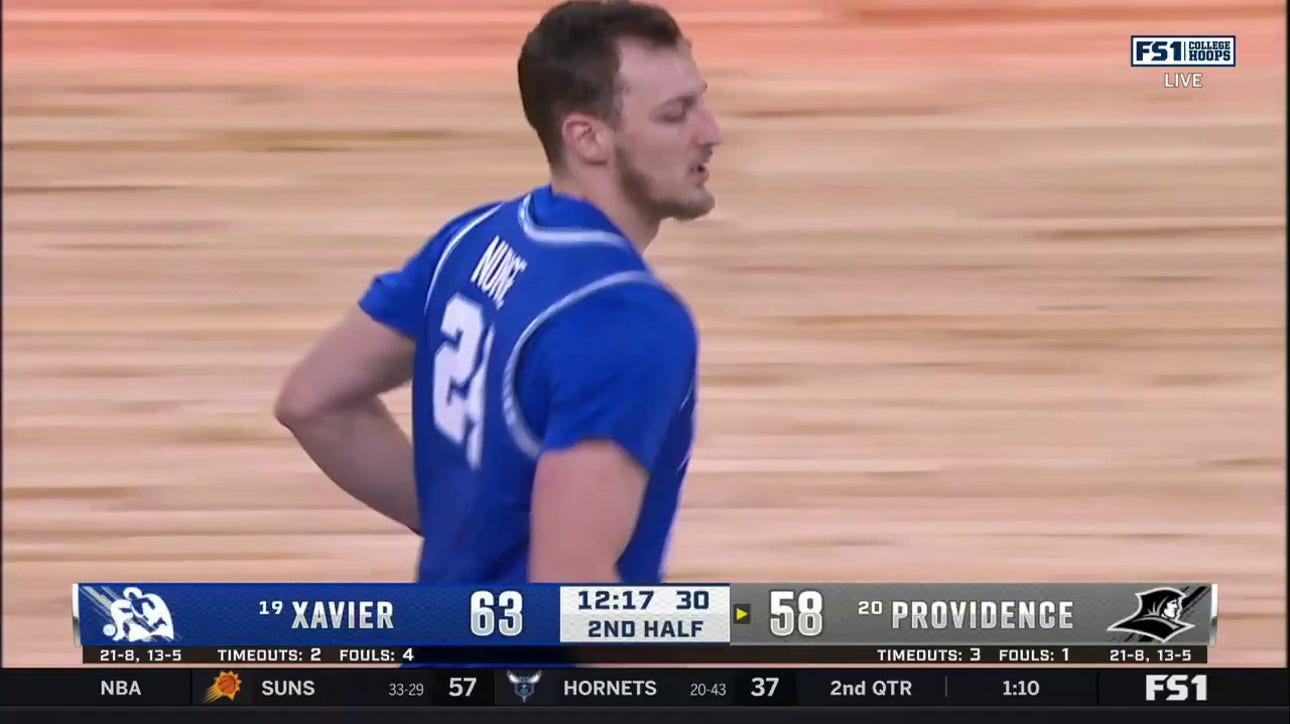 Jack Nunge extends the lead with a two-handed slam for Xavier vs. Providence