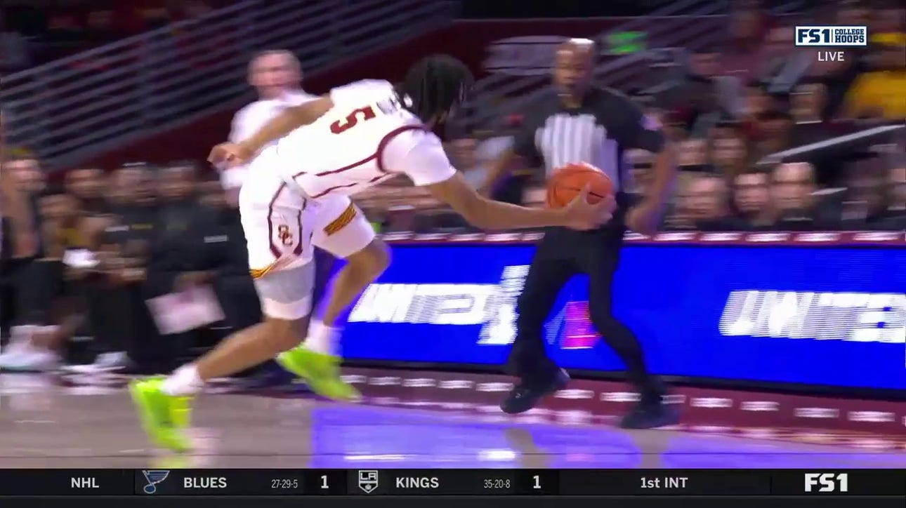 USC's Kobe Johnson throws down a fierce one-handed jam thanks to a miraculous save from Boogie Ellis