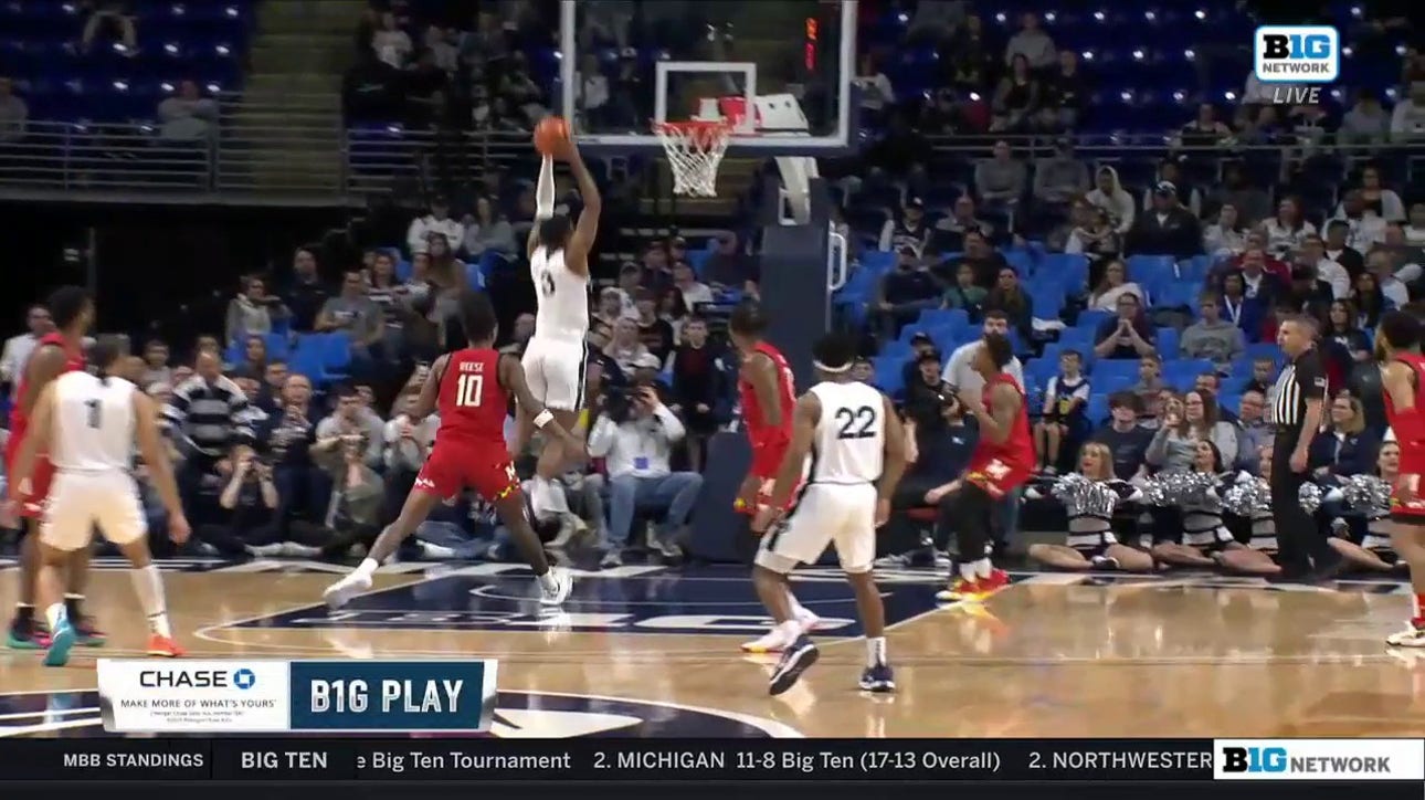 Penn State's Kebba Njie slams the two-handed dunk against Maryland