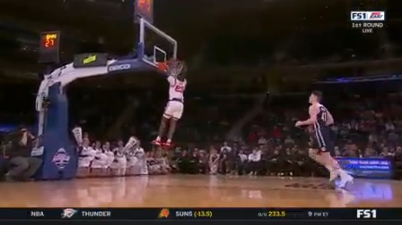 St. John's David Jones throws down the two-handed jam against Butler in the Big East Tournament