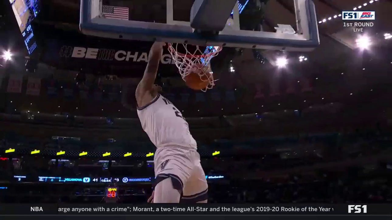 Cam Whitmore defies the laws of gravity with a massive one-handed jam for Villanova vs. Georgetown
