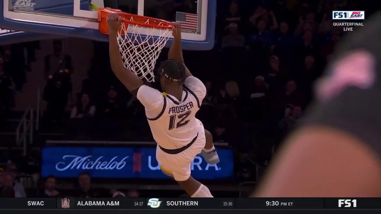 Olivier-Maxence Prosper finishes with a dunk in transition as Marquette extends its lead over St. John's