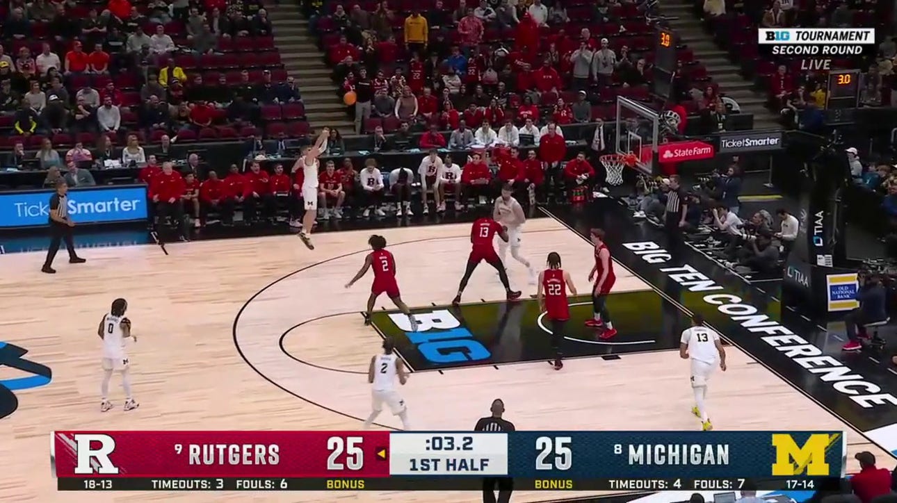 Michigan's Joey Baker hits a 3-point buzzer-beater to end the half against Rutgers