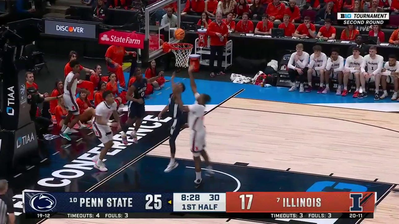 Penn State's Kanye Clary connects with Camren Wynter for a nice tip-in layup against Illinois to extend their lead