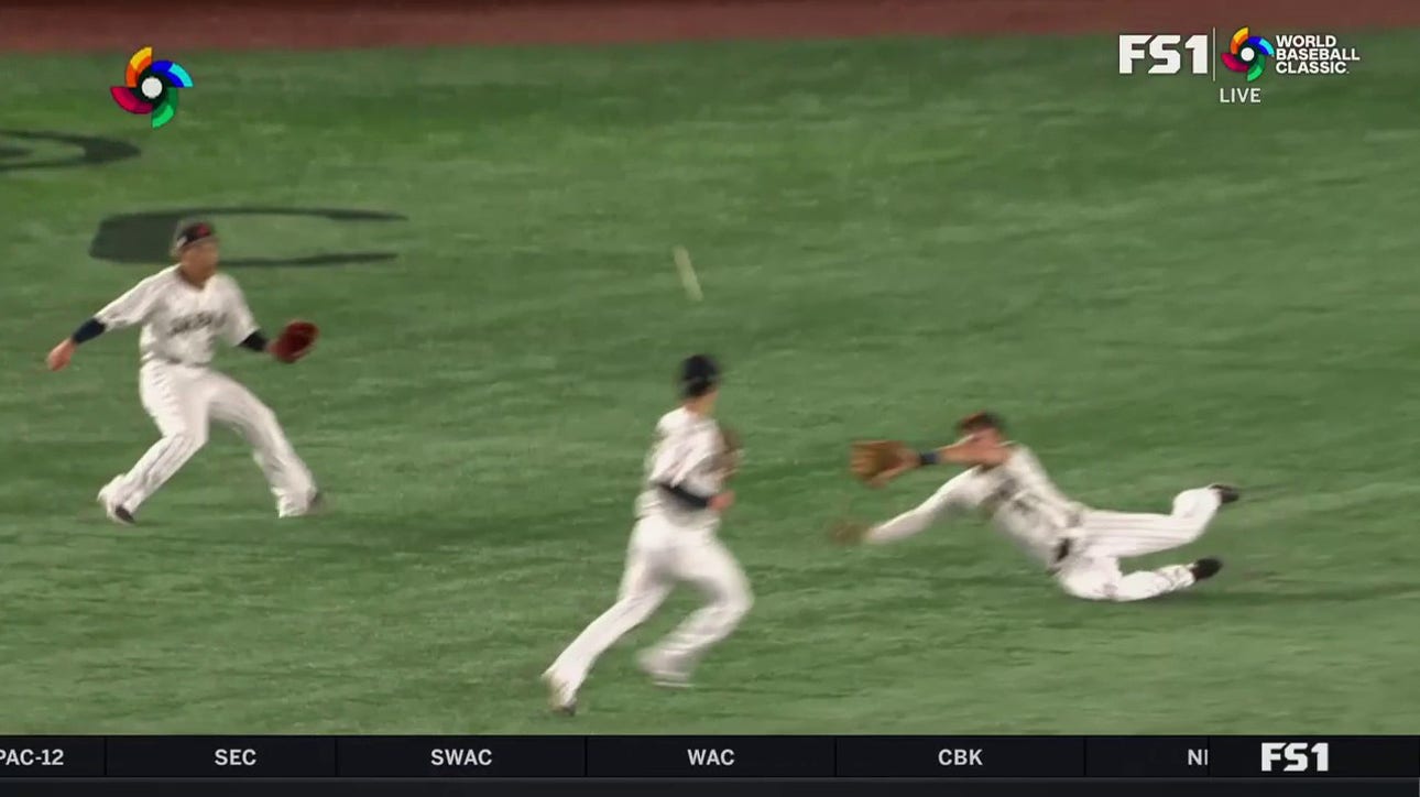 Japan's Lars Nootbaar lays out in left field to make a ridiculous play