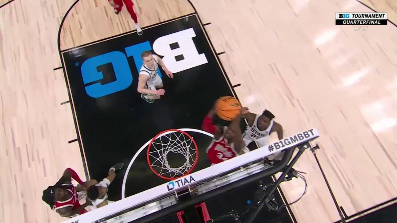 Ohio State's Felix Okpara throws down a dunk thanks to a clever bounce pass from Justice Sueing