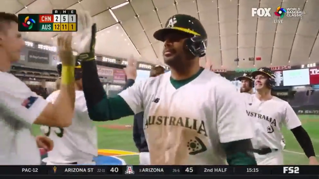 Australia's Darryl George grounds a two RBI single up the middle, defeating China 12-2 in seven innings