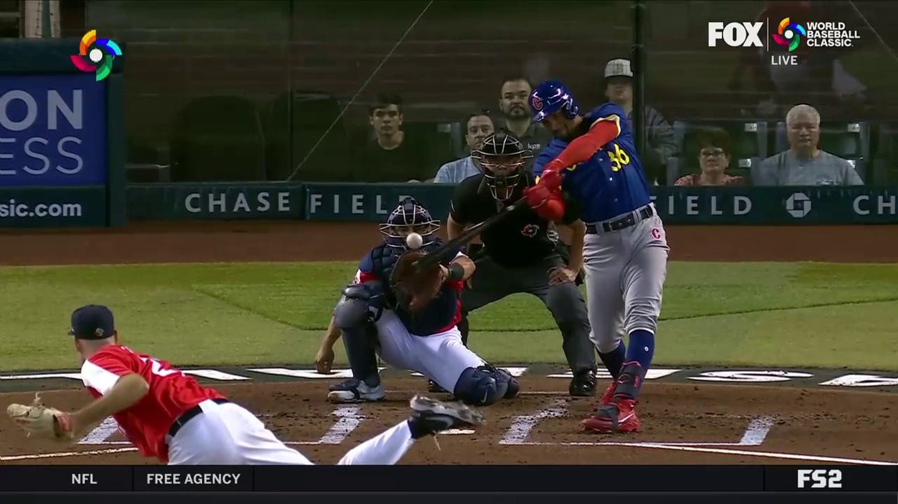 Oscar Mercado smacks an RBI single to help Colombia strike first against Great Britain