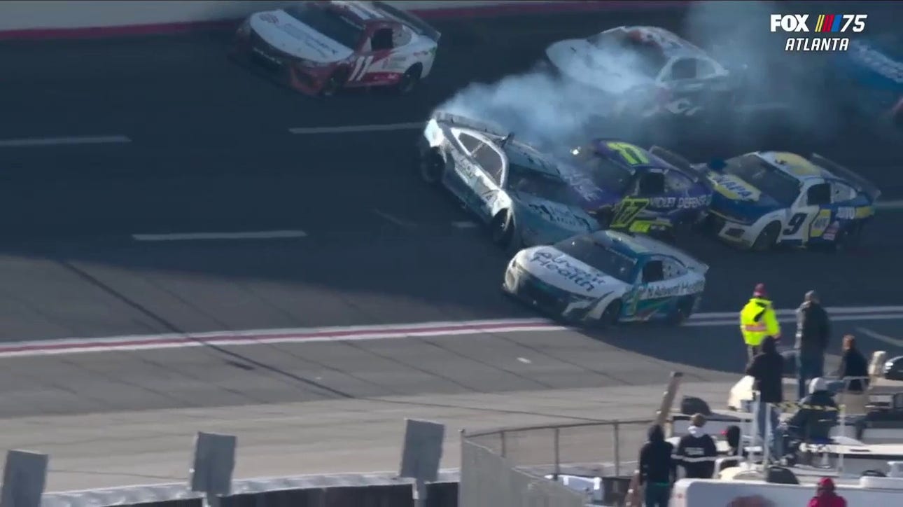 Kevin Harvick gets spun and wrecks along with Chris Buescher and Kyle Busch at the Ambetter Health 400