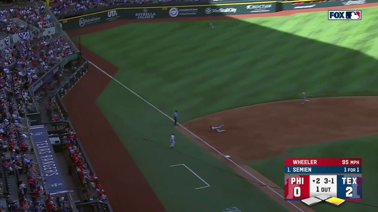 Phillies' Alec Bohm makes an unreal diving catch to get Rangers' Marcus Semien out in the second