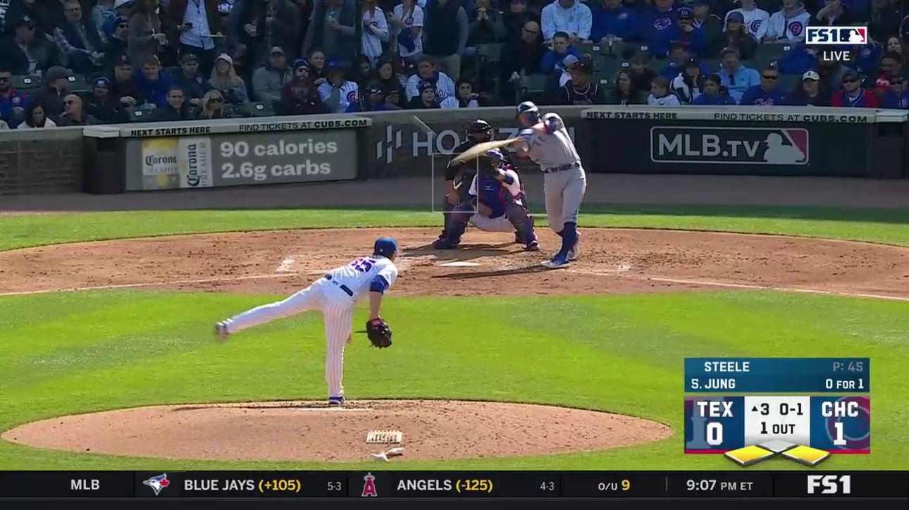 Josh Jung knocks in the Rangers' first run of the game with an RBI-single against the Cubs