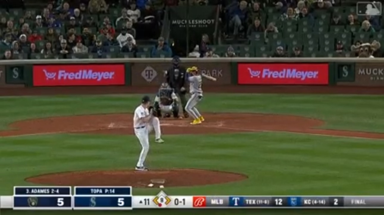 Brewers' Joey Wiemer scores the game-winning run in extra innings against the Mariners