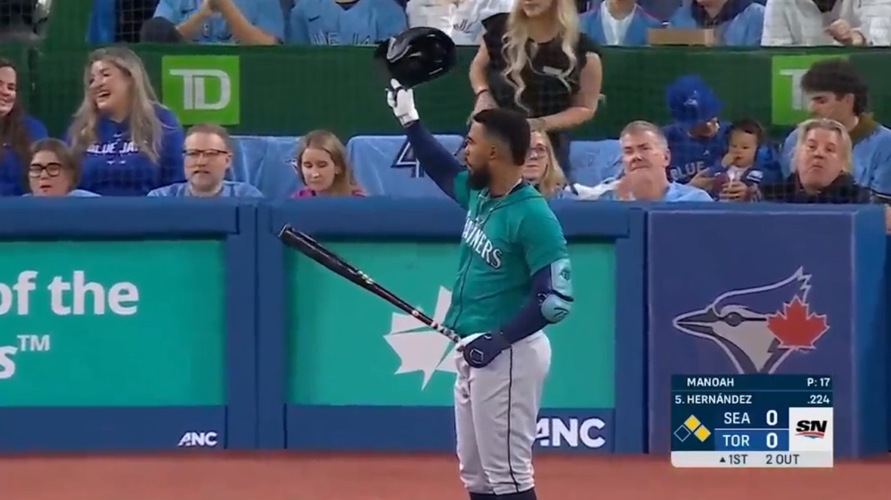 Seattle's Teoscar Hernández receives a standing ovation before his first at-bat in his return to Toronto