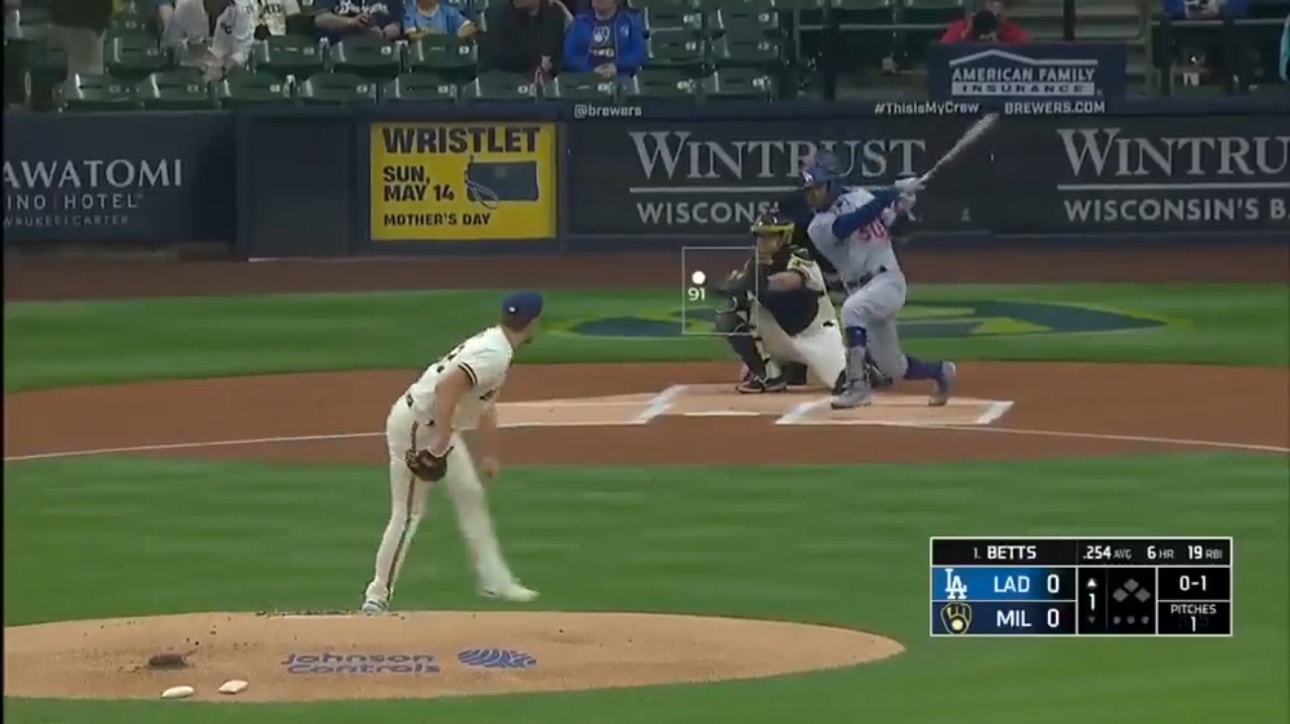 Dodgers' Mookie Betts cracks a home run against the Brewers in the first inning