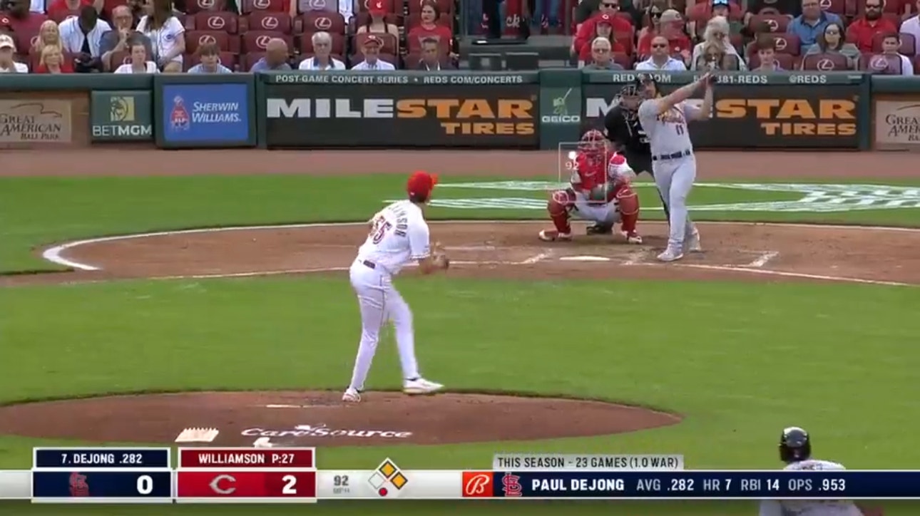 Cardinals' Paul DeJong muscles a go-ahead three-run homer to left-center field against the Reds
