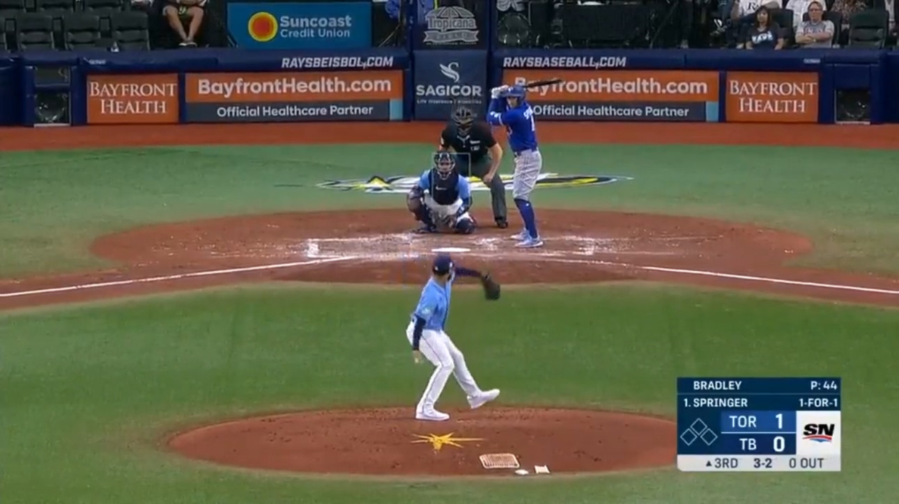 Blue Jays' George Springer cracks a solo home run against the Rays