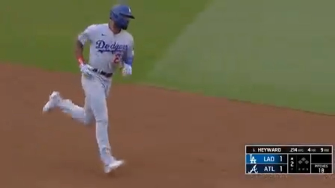 Dodgers' Jason Heyward knocks a solo home run against the Braves