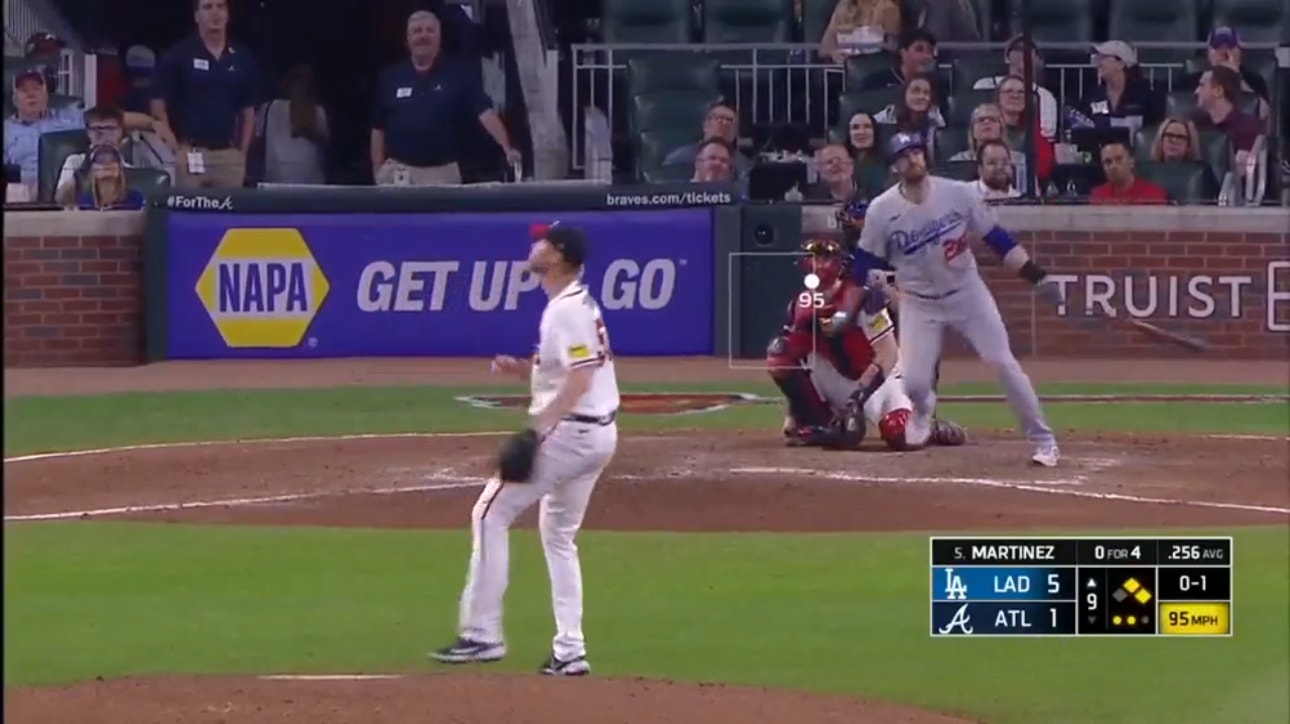 J.D. Martínez hits a three-run homer to help seal the Dodgers' win over the the Braves