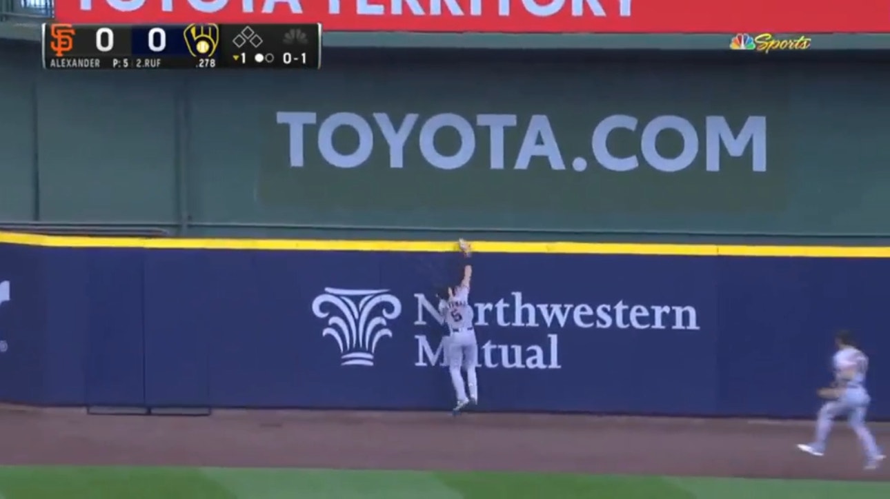 Giants' Mike Yastrzemski makes a spectacular grab to rob his former teammate Darin Ruf of a homer in the first inning