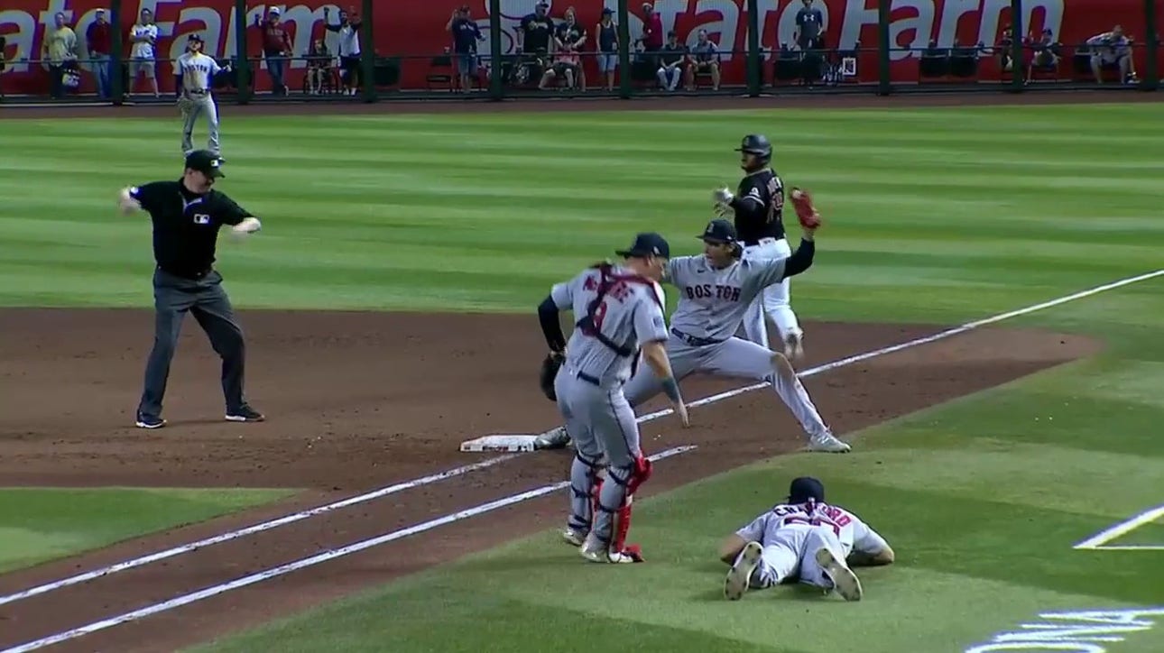 Red Sox's Kutter Crawford makes a diving under-handed throw to get the out at first