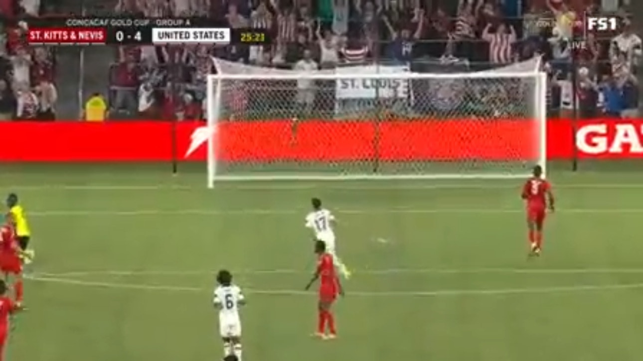 United States' Jesus Ferreira scores to go up 4-0 against Saint Kitts and Nevis