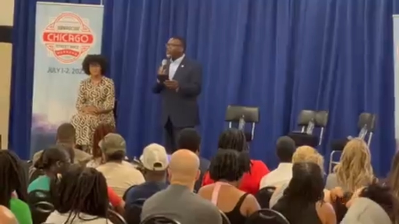 Chicago Mayor Brandon Johnson speaks at a NASCAR event with the Chicago parks district