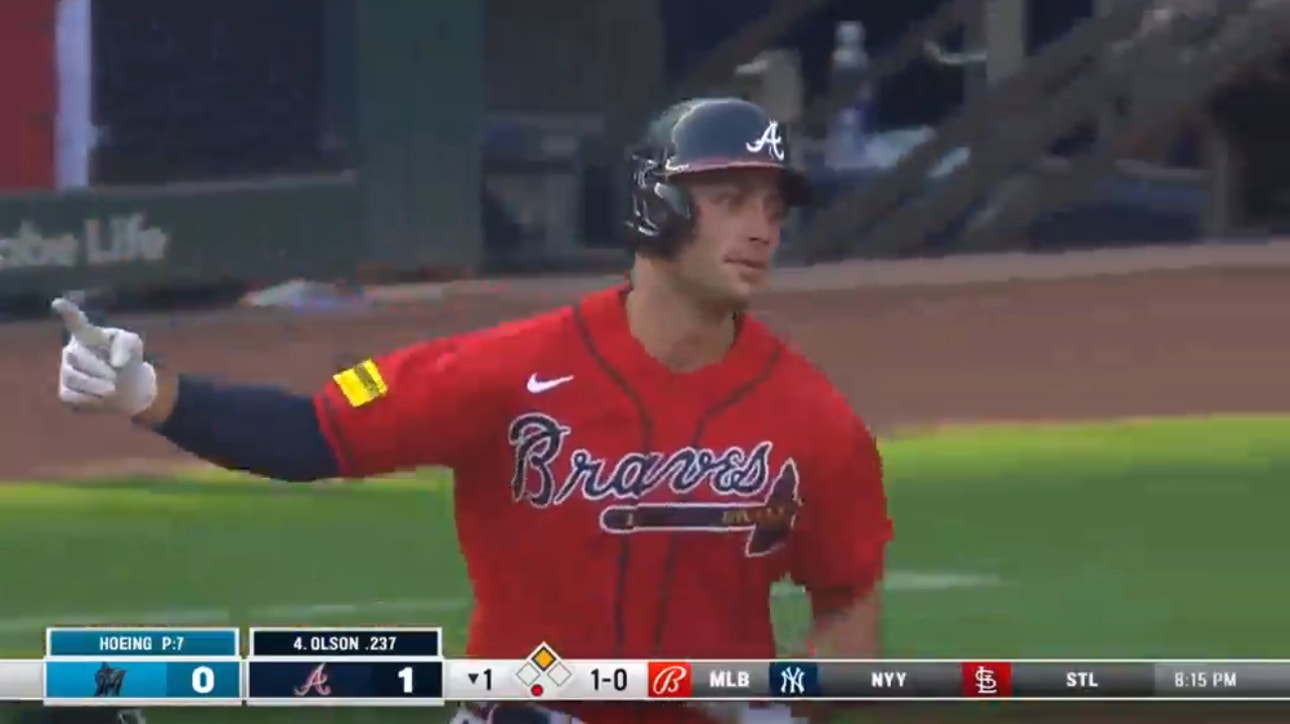 Braves' Matt Olsen hits his NL-leading 27th homer, a two-run shot to center field vs. the Marlins in the first inning