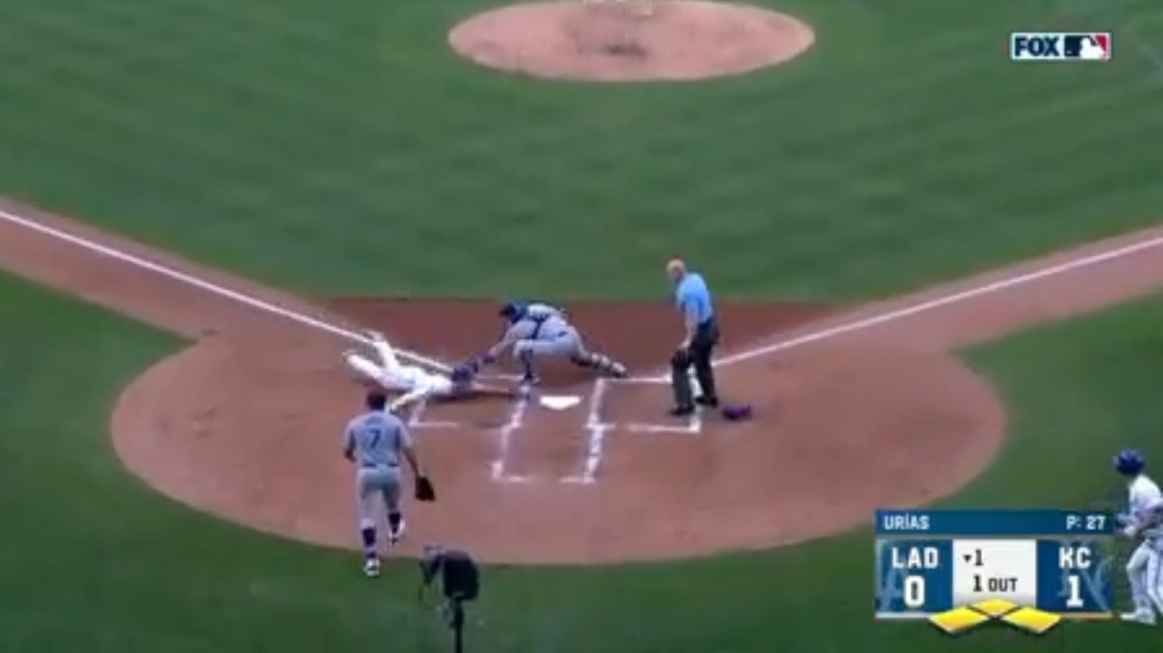 Royals' Bobby Witt Jr. blazes home and scores after a shallow sac fly to extend their lead over the Dodgers